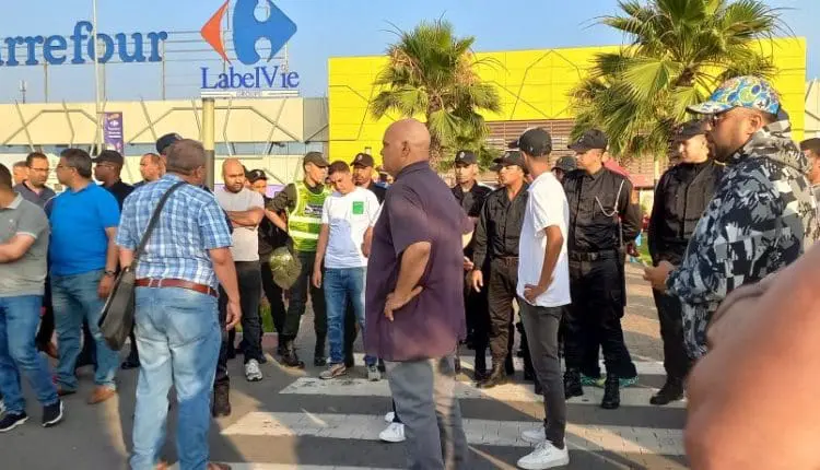 تنديد حقوقي بمتابعة 13 شخصا بعد وقفة احتجاجية أمام متجر كارفور بسلا